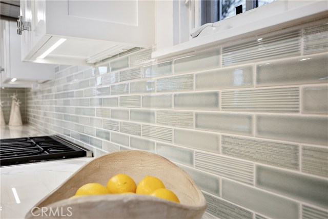 The Pratt & Larson handmade kitchen tiles offer subtle and gorgeous detail.