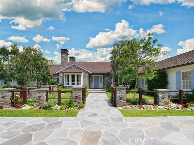 A welcoming front entry featuring details such as copper roof & gutters