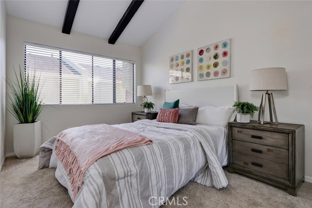spacious bedroom with vaulted ceilings!