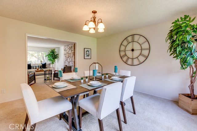 The formal dining room is the perfect size for intimate or moderately sized gatherings.