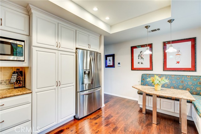 Large pantry cabinets and a large refrigerator make sure that you can be fully stocked in the kitchen