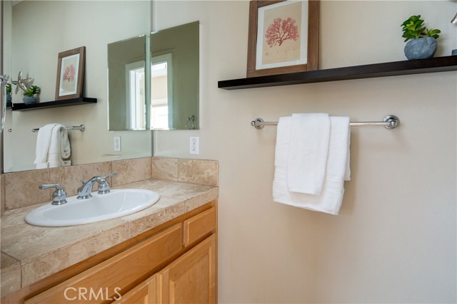 Hallway Bathroom - The bath serves the upper level living area.