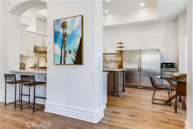 The kitchen offers a breakfast bar, dining nook and access to the main dining room