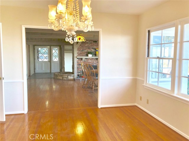 Dining Room Looking Back toward the Front Entry. Large Pocket Doors and Walk in Closet Could Make This Another Bedroom.