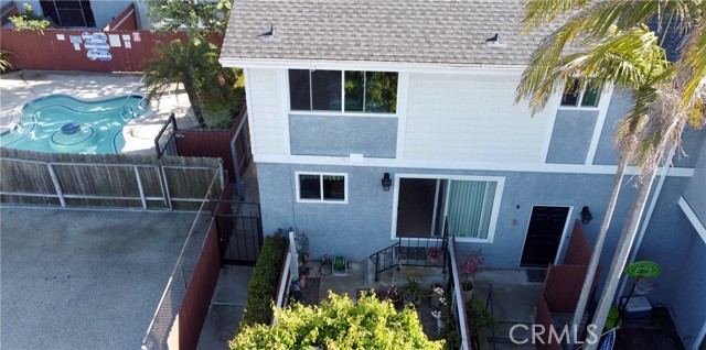 Aerial View of the Townhouse, the Patio, and the Spa for the Complex.  There is only 1 downstairs Bathroom Window facing the Spa area, it is just steps away.