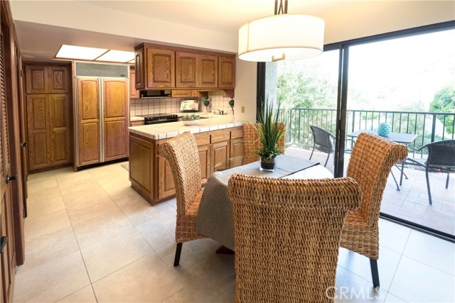 Breakfast Area off Kitchen looks out onto balcony.