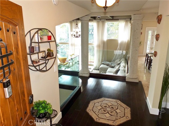 Entryway of the main home with decorative enlaid marble.