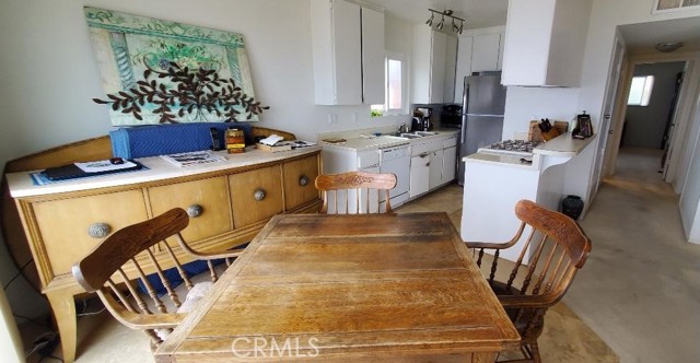 Dining Area and Kitchen have Travertine Floors
