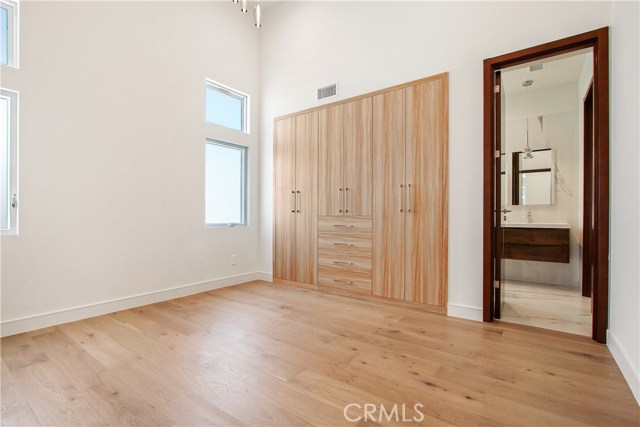 Bedroom #1 with custom built in with Jack and Jill bathroom