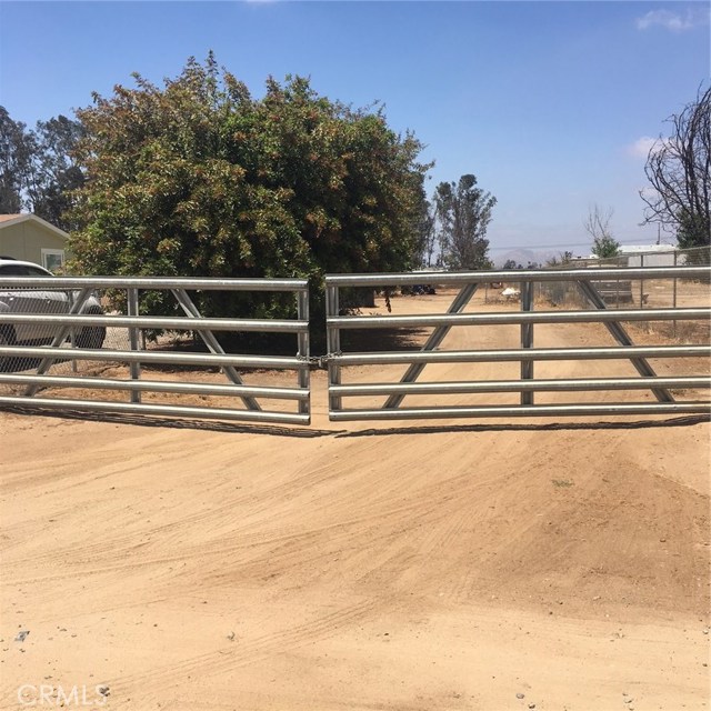 Large double side gates to rear yard