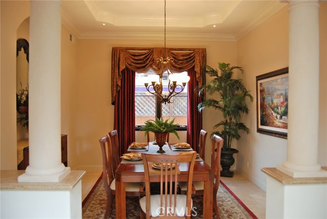Dining room with coved ceiling