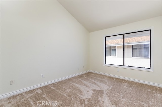 West bedroom with vaulted ceilings