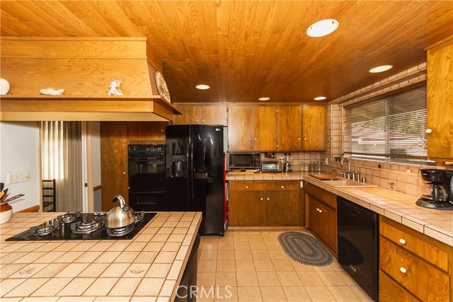 Open Kitchen with new Oven, Range, and Dishwasher.  Refrigerator is included.