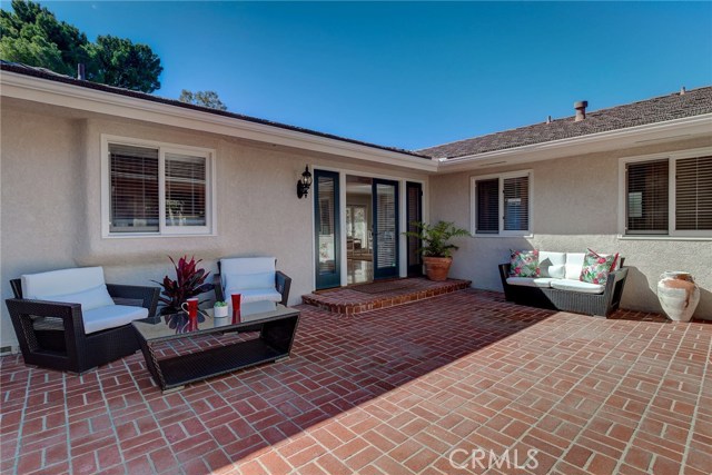 The large gated courtyard embraces Southern California's outdoor lifestyle.