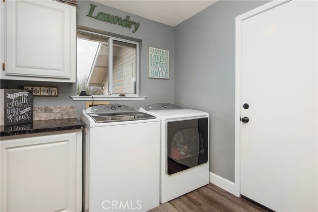 Laundry room with door into garage