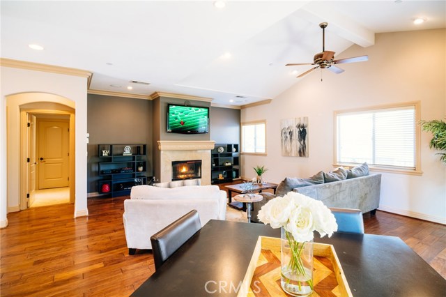 The living room is pre-wired for an entertainment center and other media with surround sound built-in the ceiling, the home is ready to be set-up for your A/V needs.