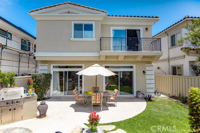 Lovely backyard with built in fire pit and BBQ