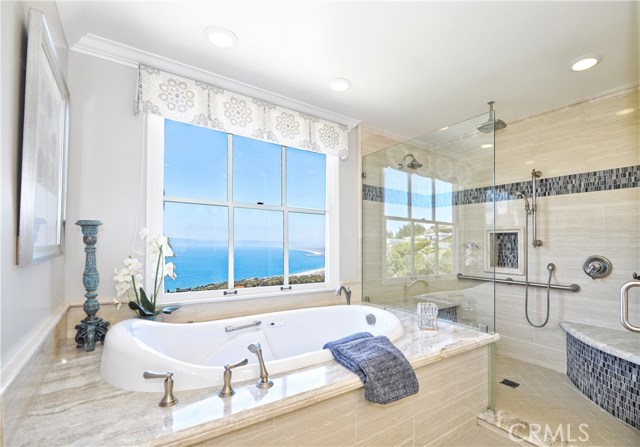 Master Bathroom has bathtub with full view.