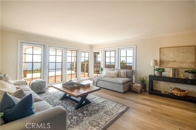 Panoramic ocean views in the main living room with Palos Verdes Stone fireplace