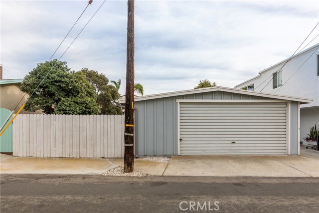 Rear view showing two car garage.