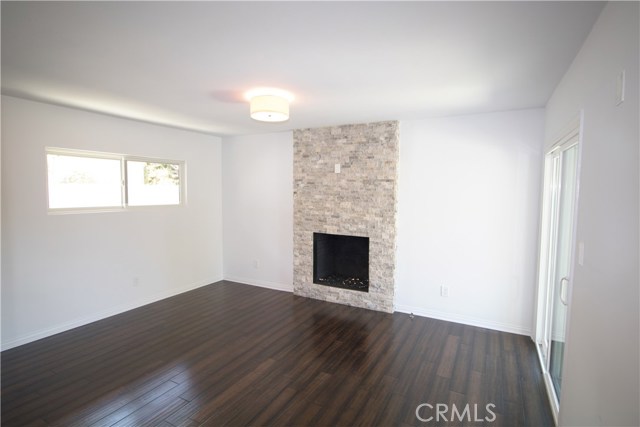 Master Bedroom ensuite with private bath & cozy fireplace. New Floating Engineered wood flooring throughout, new dual glazed fiberglass windows, new interior solid core doors throughout, fresh paint inside and out