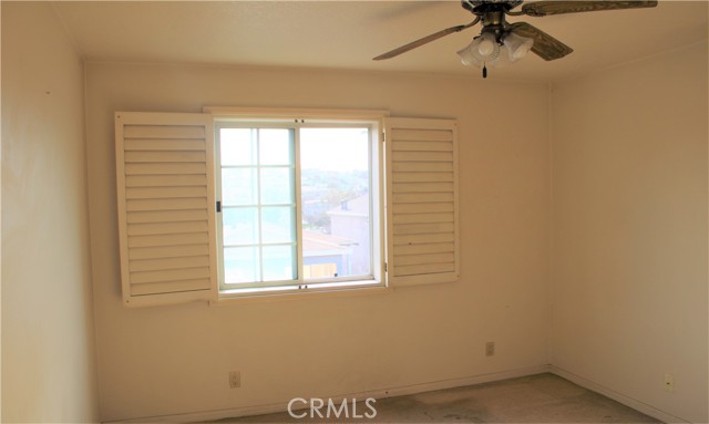 Bedroom #1 with big windows and walk in closet