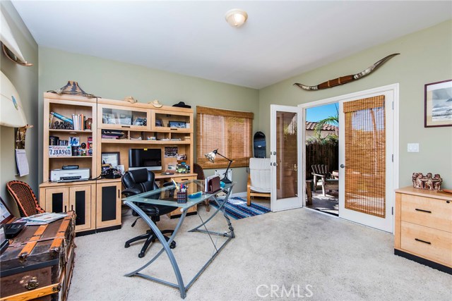 Fourth bedroom with access to rear yard.