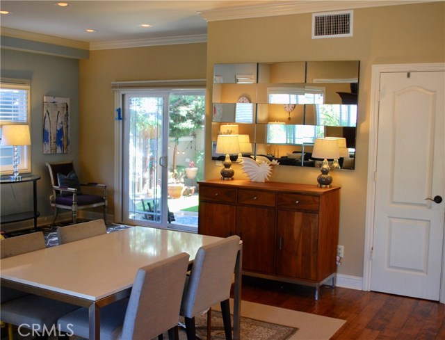Dining area opposite kitchen and living room.