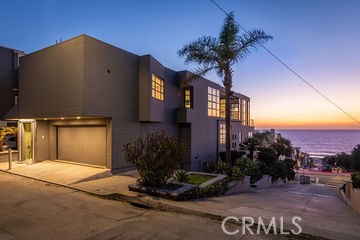 3 Car garage with two car guest parking