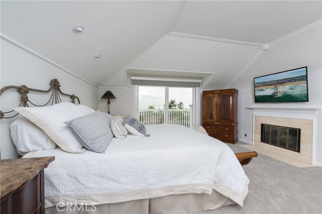 Another view of the master bedroom with it's own fireplace and view from bed!