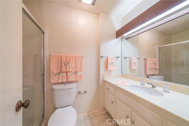 The Master bathroom offers a full stand up shower and large vanity with ample storage.