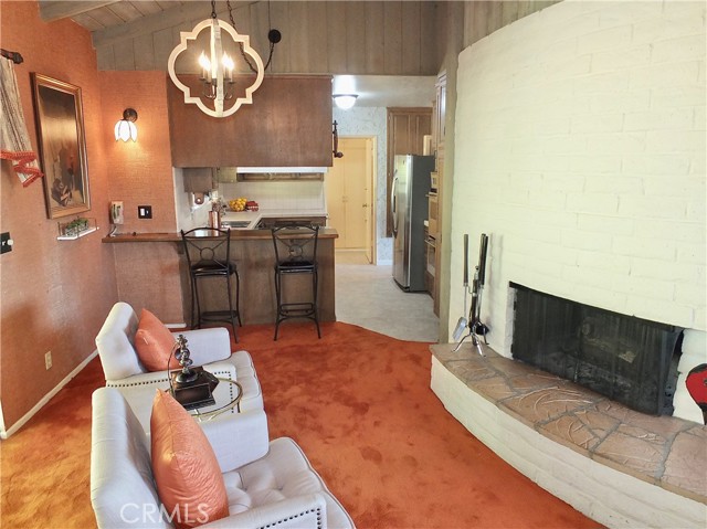 Relax by the fireplace in your new family room