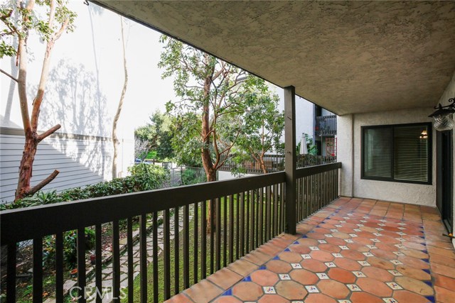 Wide private balcony looking out to Hermosa Green Belt.