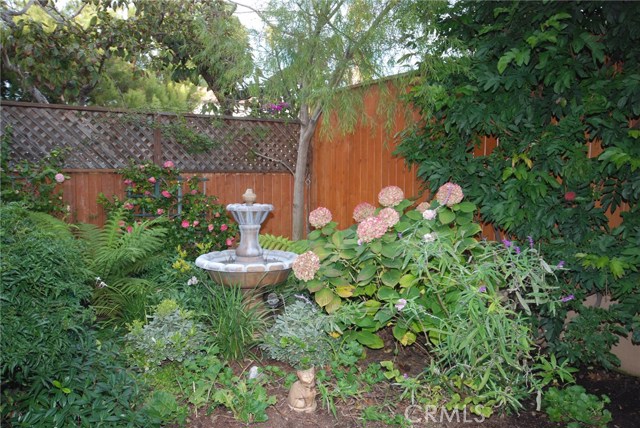 Relaxing zen-like fountain in backyard retreat