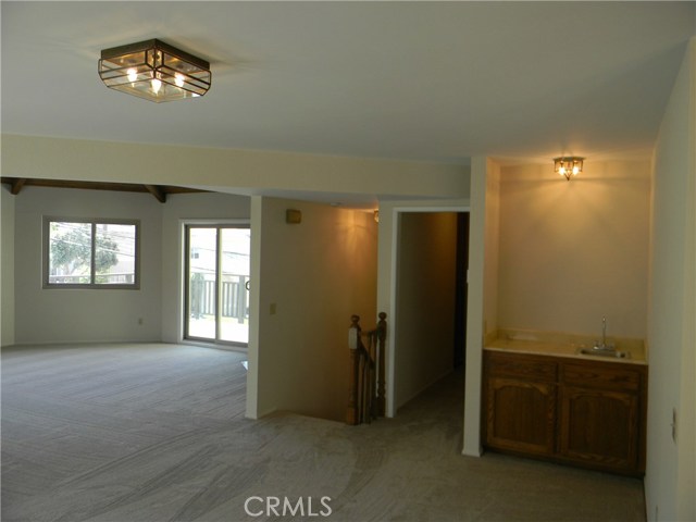 Another View of Stairwell, bar & Living Room