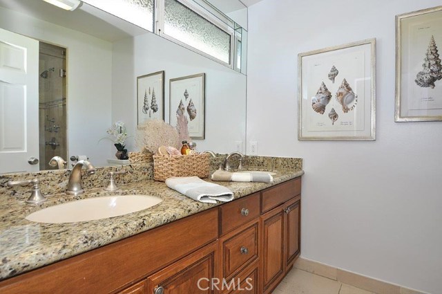 Master Bath with Double Sinks and large shower.