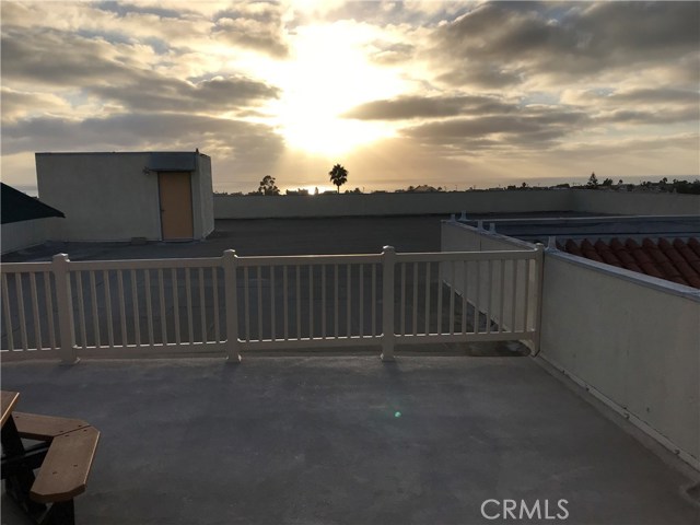 View of Sun Setting from Rooftop Deck.