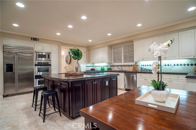 Great room west wall... kitchen, eat in kitchen area, and over-sized pantry!