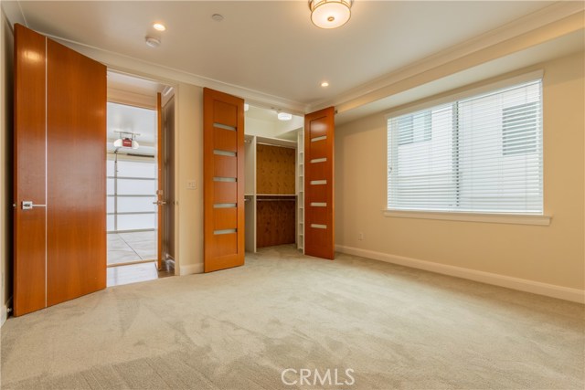 Downstairs bedroom walk in closet