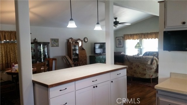 Kitchen with large eating counter.