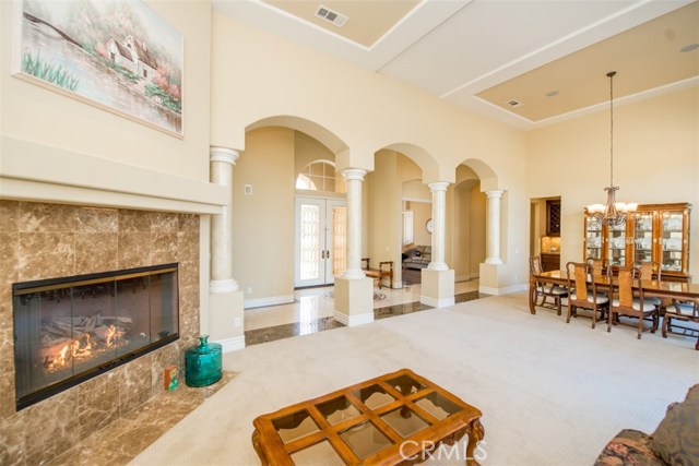 Living Room featuring Marble Fireplace.