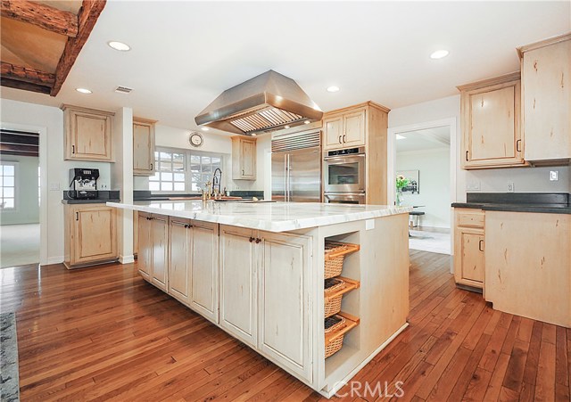 Beautiful cook's kitchen with marble-topped island and all new appliances.