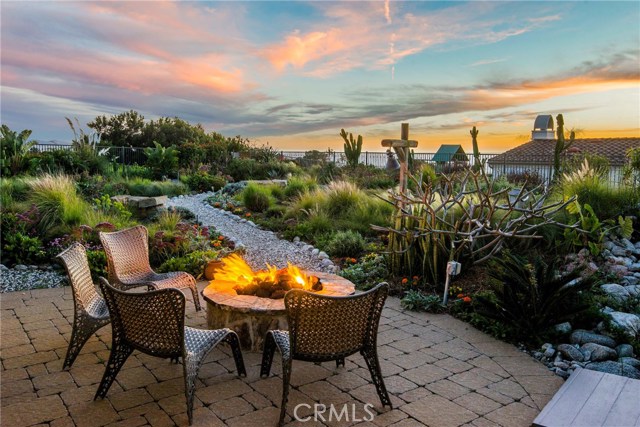 Nice and cozy fire pit with the Pacific Ocean in the background - a tranquil place to enjoy the great weather in Palos Verdes.