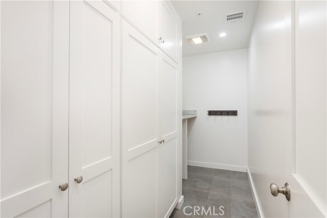 KITCHEN PANTRY AND LAUNDRY ROOM IN THE BACK