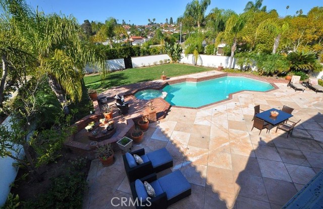 Backyard View with Patio, Pool & Spa and Grassy Area
