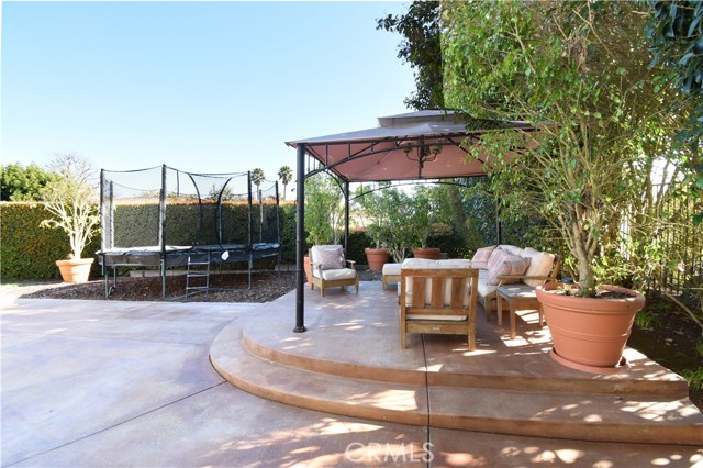 Raised patio with patio cover.