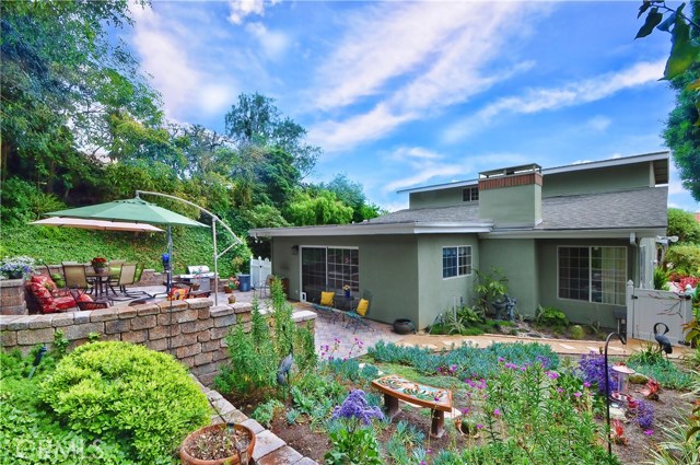 Lovely, Professionally Landscaped Backyard is a relaxing spot for family and friends.