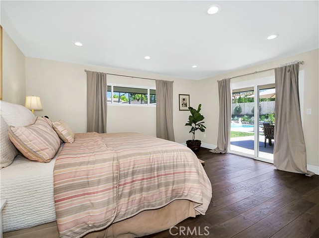Master bedroom with larger slider doors to the outside patio