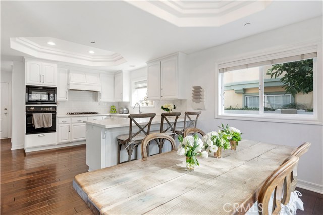 White cabinetry, coved ceilings