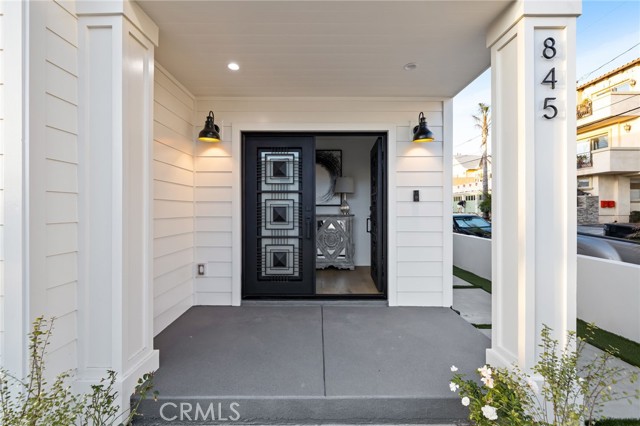 A corner lot on a quaint street in the coveted seaside community of Hermosa Beach